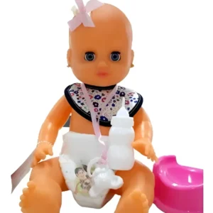 Mi bebè con mamadera y pelela